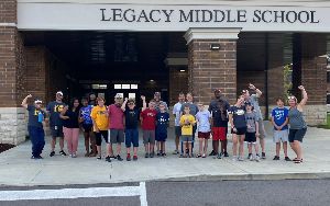 PTO parents, students and staff on campus clean up day